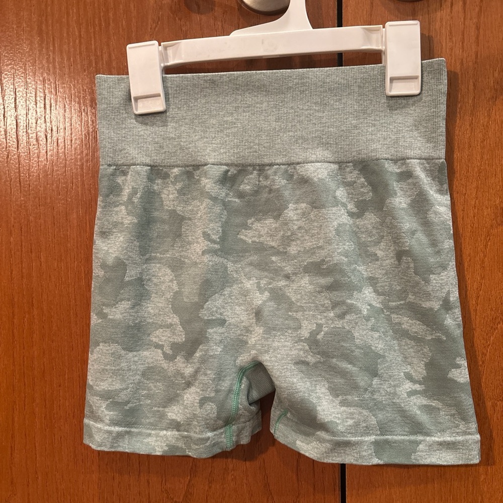 Green gym shorts
